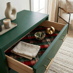 Red and green plaid wrapping paper used as a decorative drawer liner by Wrapped Studios.