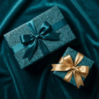 Luxury teal wrapping paper with gold and teal satin bows by Wrapped Studios.