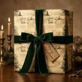 Vintage Christmas wrapping paper with dark green velvet ribbon and "Merry Christmas" tag.