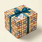 Fun dentist gift: Colorful wrapping paper with tooth pattern, teal ribbon, perfect for dental student graduation or DDS birthday.