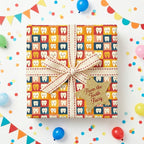 Fun "From the Tooth Fairy" gift wrapped in colorful cartoon teeth wrapping paper with star tag and confetti.
