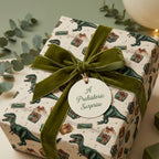 Dinosaur birthday wrapping paper from Wrapped Studios. Gift wrapped with velvet olive ribbon.