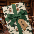 Dinosaur birthday wrapping paper featuring a gift wrapped with a forest green ribbon and a "Roar" tag.