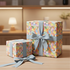 Pastel gift boxes wrapped in colorful, abstract pattern wrapping paper, tied with light blue ribbon bows.
