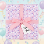 Square gift wrapped in pastel polka dot birthday wrapping paper with pink ribbon and "For You!" tag.