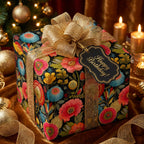 Elegant floral birthday wrapping paper with gold ribbon and "Happy Birthday" tag.