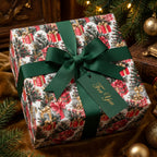 Luxury Christmas wrapping paper with holiday print, elegant green ribbon and tag by Wrapped Studios.