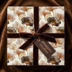 Luxury ginkgo leaf wrapping paper with a brown velvet bow by Wrapped Studios.