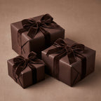 Elegant solid brown wrapping paper with velvet ribbon on square gifts for sophisticated gift-giving.