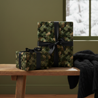 Wrapped gifts with evergreen-patterned Christmas gift wrap and black satin ribbon on a wooden bench.
