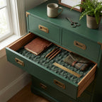 Forest green pine tree wrapping paper used as a rustic dresser drawer liner, by Wrapped Studios.