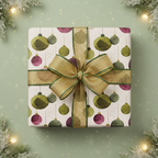 Christmas gift wrap with a festive ornament pattern in green and maroon, tied with a luxurious gold and green ribbon bow.