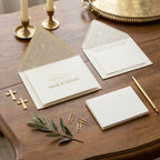 Elegant First Holy Communion invitations with gold foil and patterned lined envelopes by Wrapped Studios.