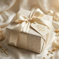 Luxury baptism wrapping paper with crosses and cream satin bow by Wrapped Studios.