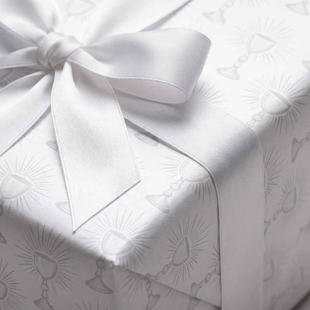 First Communion wrapping paper with silver chalices and a white satin bow by Wrapped Studios.