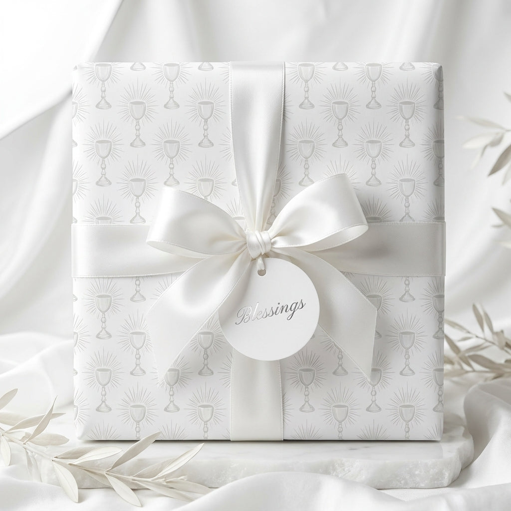 First Communion wrapping paper with a white chalice pattern and satin bow by Wrapped Studios.