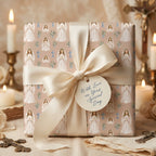 First Communion wrapping paper with a praying girl design and elegant cream bow by Wrapped Studios.