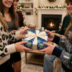 Exchanging gifts wrapped in blue floral Christmas wrapping paper with an ivory ribbon.