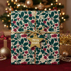 Elegant floral Christmas gift wrap with gold ribbon and "Merry Wishes" star tag.