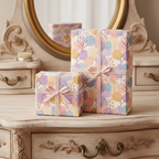 Gifts wrapped in floral wrapping paper with lavender ribbon, perfect for birthday or baby shower presents.