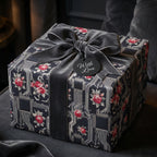 Luxury gothic floral and circuit board wrapping paper with a grey velvet bow by Wrapped Studios.