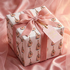 Floral acoustic guitar wrapping paper with a pink velvet ribbon by Wrapped Studios.
