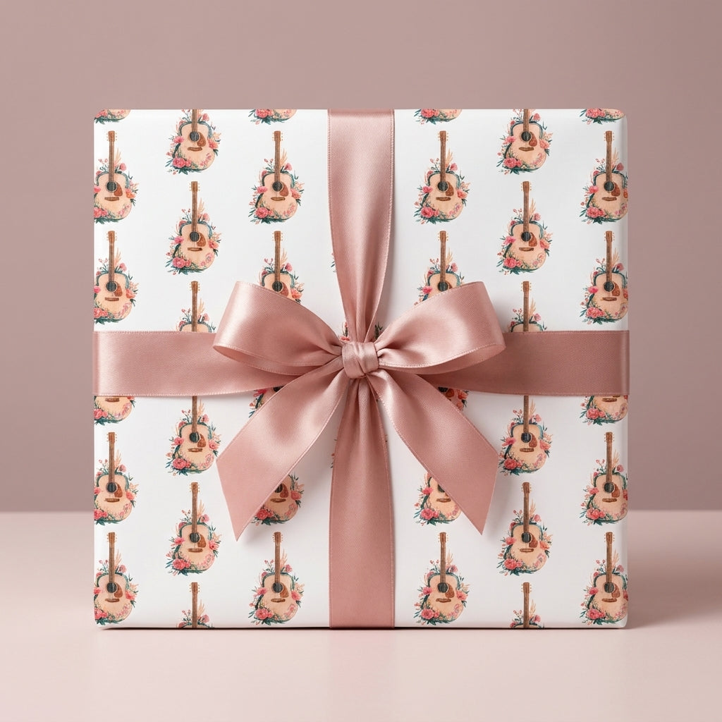 Boho acoustic guitar floral wrapping paper on a gift box with a pink bow, by Wrapped Studios.