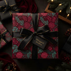 Elegant floral wrapping paper in maroon and teal, tied with a black ribbon for luxurious gift presentation.
