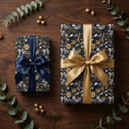 Elegant floral wrapping paper in navy and gold, with satin ribbons.