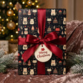 Cute cat Christmas wrapping paper with a burgundy bow and Merry Christmas tag, by Wrapped Studios.