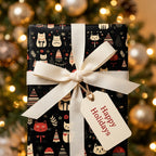 Cat Christmas wrapping paper by Wrapped Studios on a gift box with a cream bow and holiday tag.