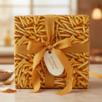 Unique novelty wrapping paper featuring french fries with gold ribbon and tag.