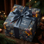 Elegant Christmas gift wrap with a blue satin ribbon and festive pinecone design.