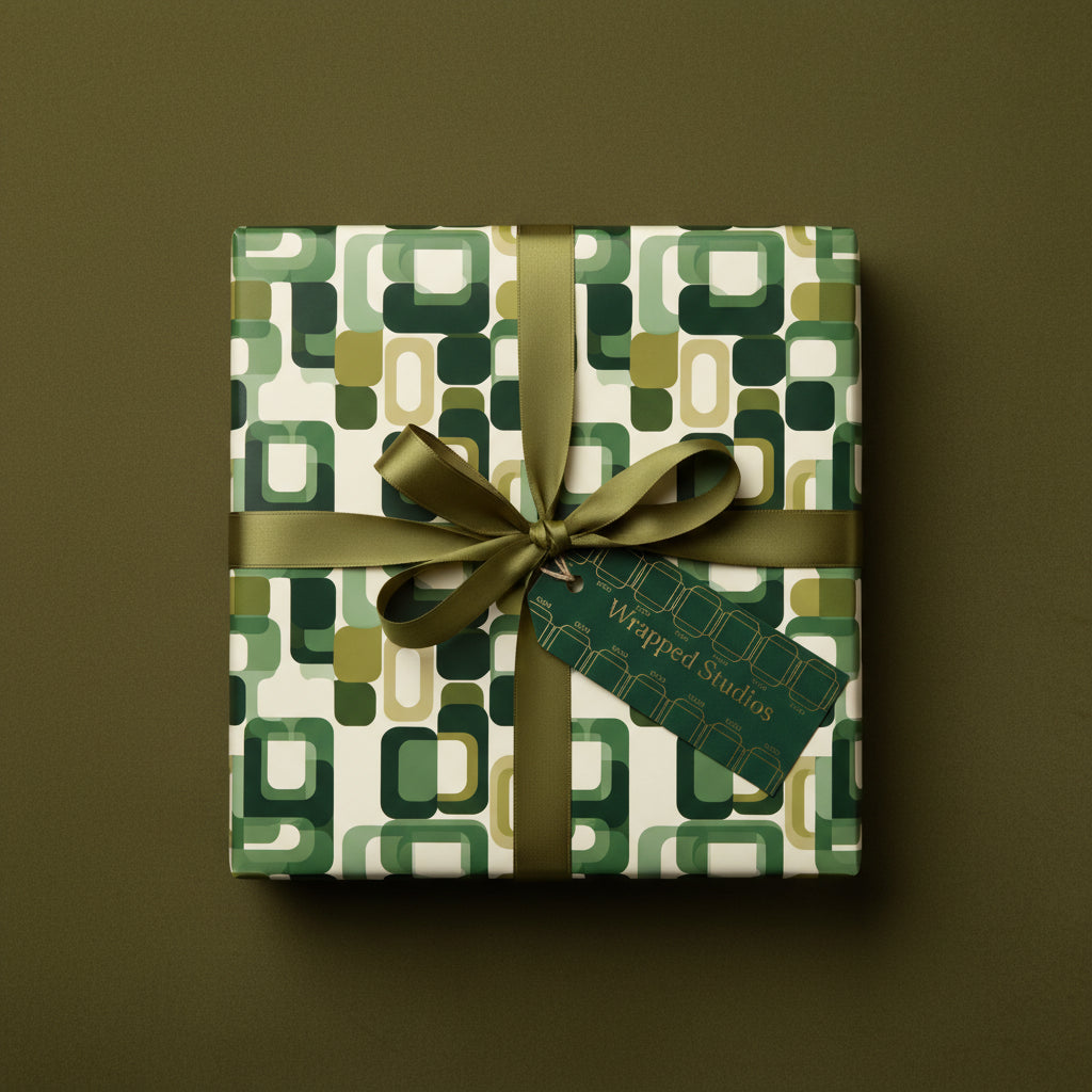 Retro green geometric pattern wrapping paper with a matching ribbon and gift tag.