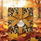 Modern gift wrap with geometric squares and a mustard ribbon for fall birthdays or Thanksgiving gifts.