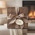 Luxury gift wrapped in minimalist woodgrain paper with a champagne satin ribbon and "Wrapped with Love" tag.