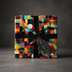 Geometric wrapping paper in colorful mid-century modern design with black velvet ribbon for birthday gift.
