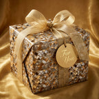 Elegant gold mosaic gift wrap with "For You" tag and satin ribbon bow, Wrapped Studios.