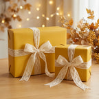 Mustard yellow gifts wrapped with lace ribbon, perfect for elegant birthdays or fall celebrations.