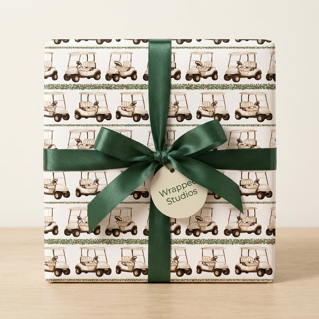 Golf wrapping paper by Wrapped Studios with a vintage golf cart pattern and forest green satin ribbon.