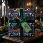 Witchy gothic Christmas wrapping paper with a green velvet bow by Wrapped Studios.
