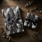 Fantasy dragon wrapping paper in black and white on gifts with elegant bows by Wrapped Studios.