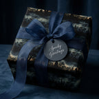 Elegant Halloween gift, wrapped in spooky graveyard pattern paper with navy ribbon and "Spooky Greetings" tag.