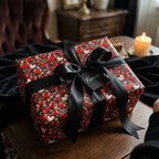 Romantic red heart wrapping paper with a black satin bow and Forever tag by Wrapped Studios.