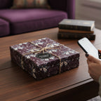 Elegant butterfly-themed gift wrapped in floral wrapping paper with rustic twine, ready to be photographed.