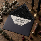 Gothic masquerade invitation in black envelope with raven liner by Wrapped Studios.