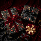 Moody floral wrapping paper with burgundy velvet ribbons on elegant gift boxes by Wrapped Studios.