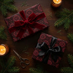 Luxury burgundy gothic Christmas wrapping paper with red velvet and black satin bows by Wrapped Studios.