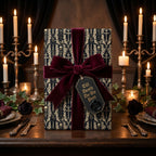 Gothic Till Death Do Us Part wedding wrapping paper with burgundy velvet bow by Wrapped Studios.