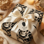 Gothic skull wrapping paper with cream satin bow and "Eternally Yours" gift tag by Wrapped Studios.